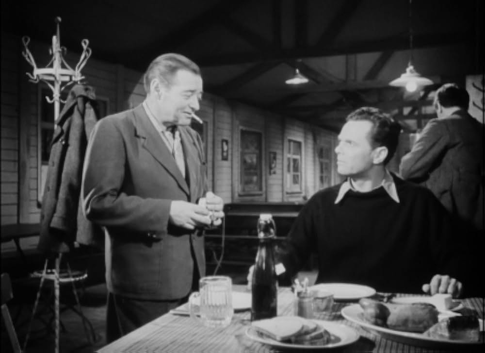 追い詰められた男の画像