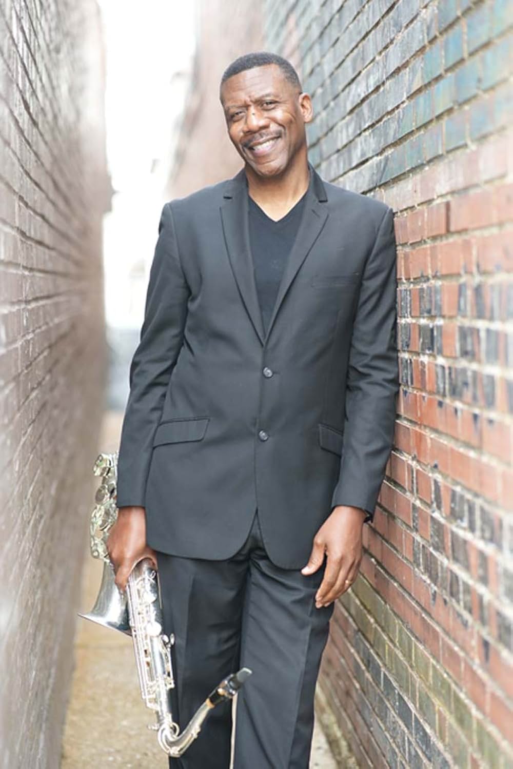 逃亡者 組織を裏切った男の写真