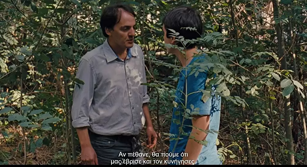 少年と自転車の画像