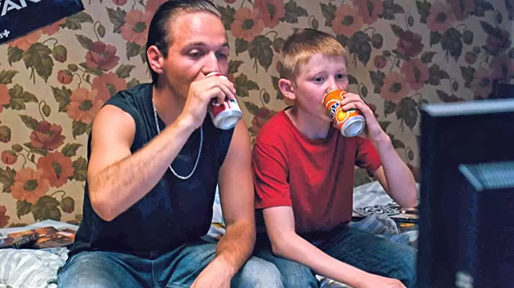 少年と自転車の画像