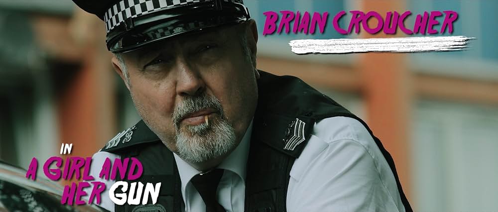 少女と拳銃の画像