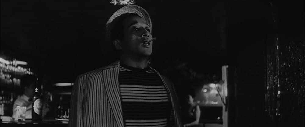 虹をつかむ男の画像