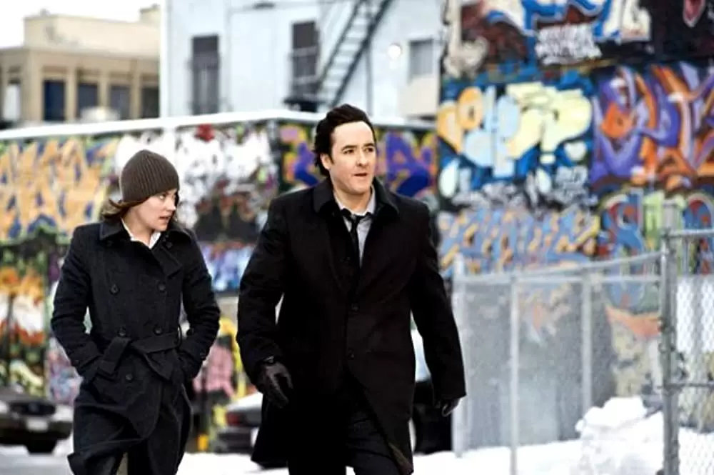 「コレクター」ジョン・キューザック & ジェニファー・カーペンターの画像