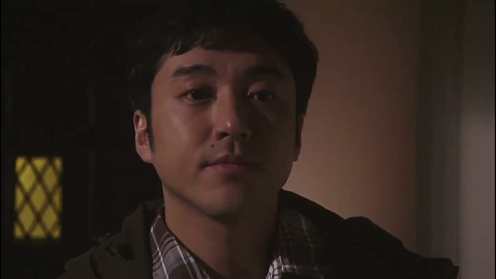 呪怨 白い老女の画像