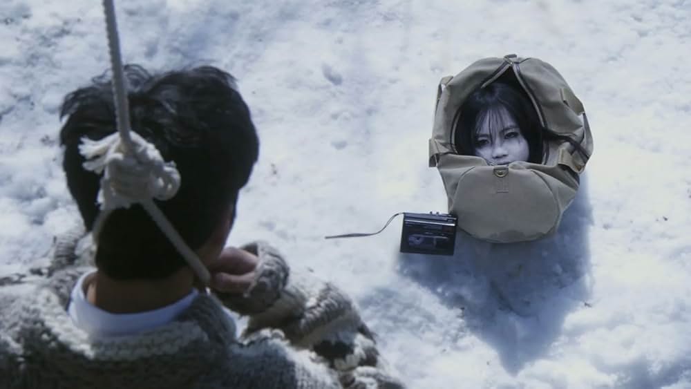 呪怨 白い老女の画像