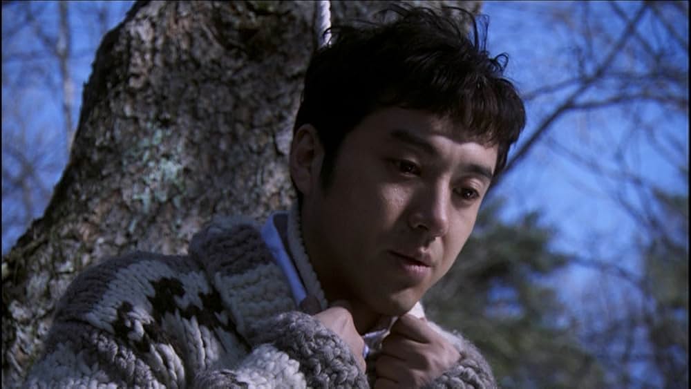 呪怨 白い老女の画像