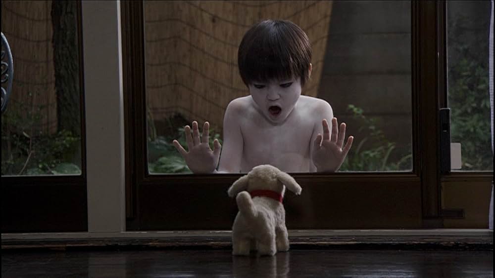 呪怨 白い老女の画像