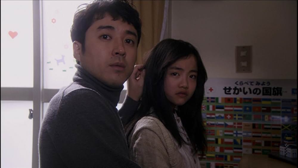 呪怨 白い老女の画像