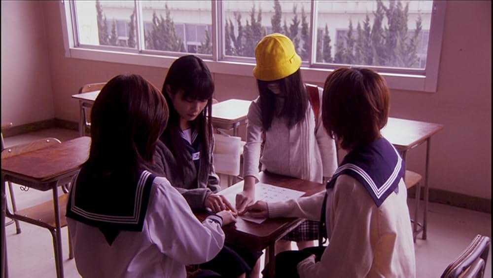 呪怨 白い老女の画像