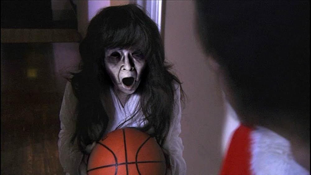 呪怨 白い老女の画像