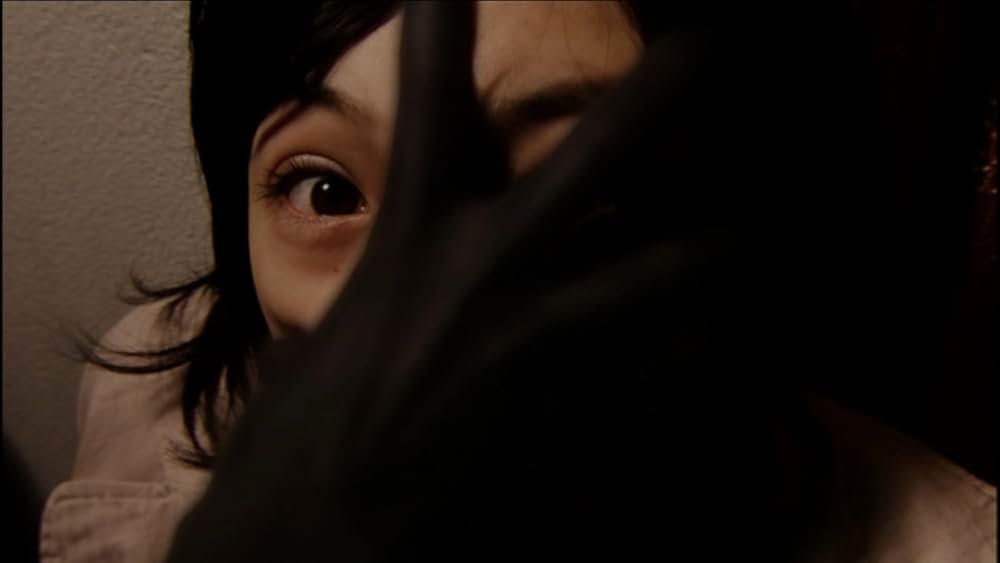 呪怨 黒い少女の画像