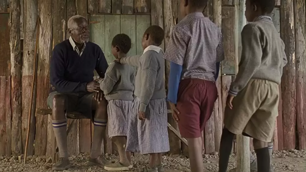 おじいさんと草原の小学校の画像