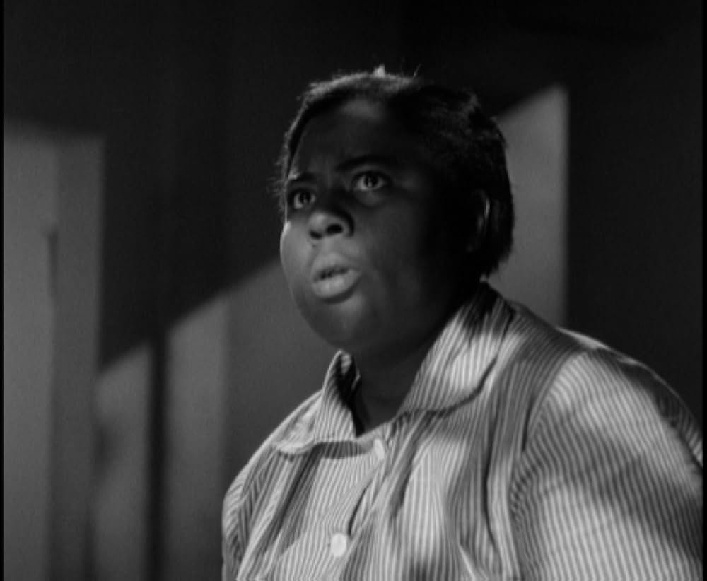 鉄窓と花束の画像