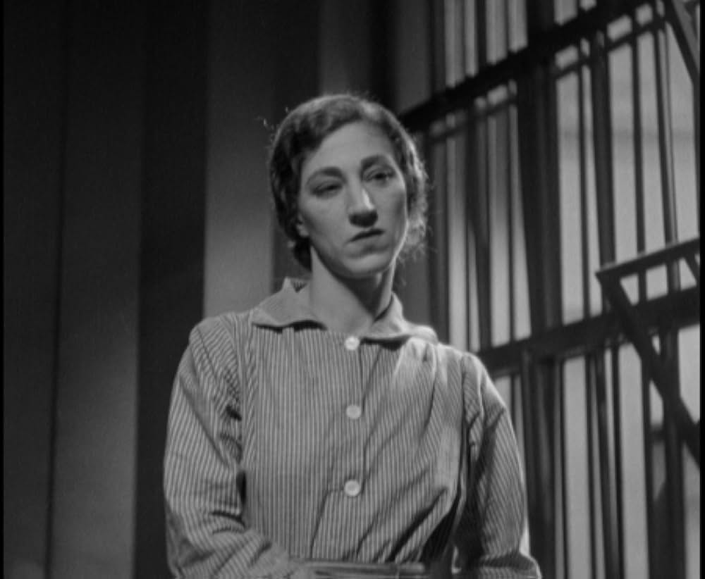 鉄窓と花束の画像