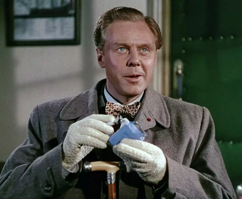 汽車を見送る男の画像