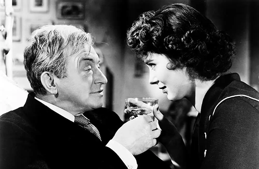 「汽車を見送る男」クロード・レインズ & マータ・トーレンの画像