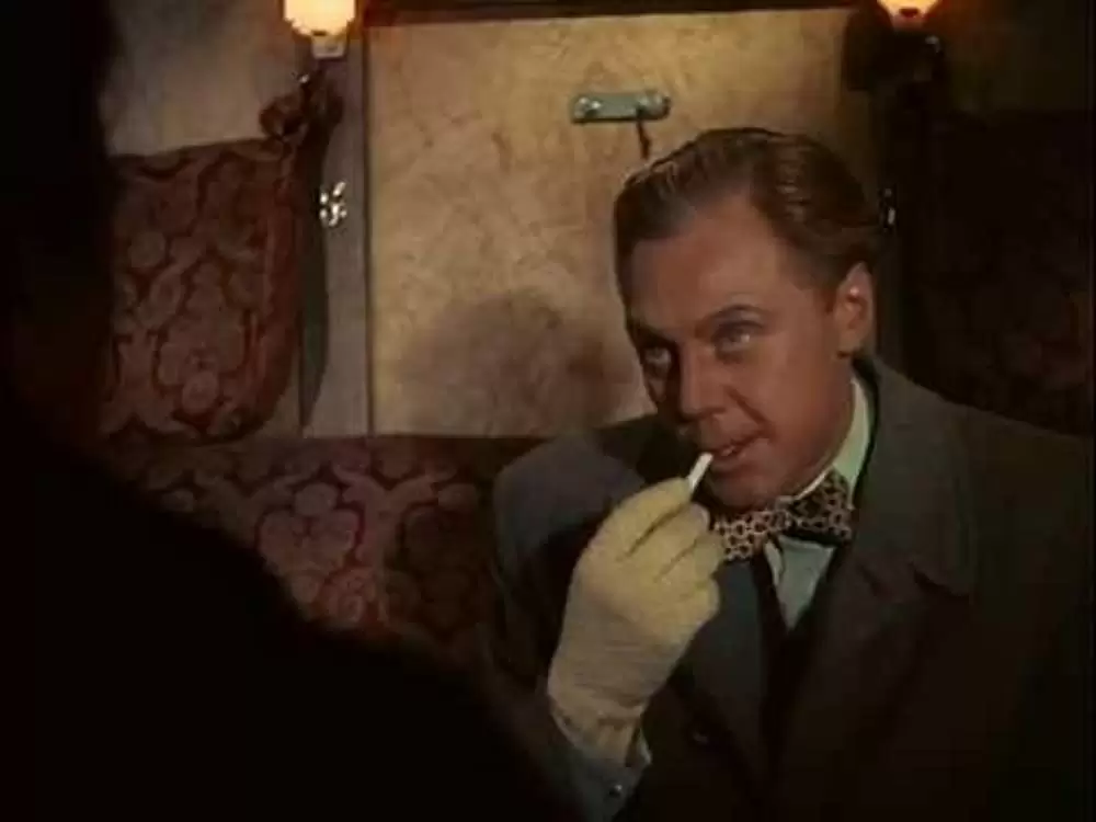 汽車を見送る男の画像