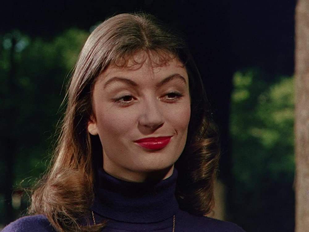 汽車を見送る男の画像