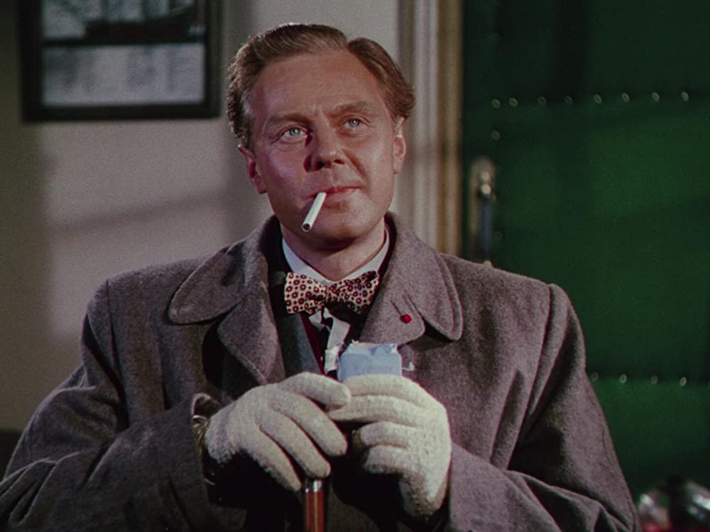 汽車を見送る男の画像