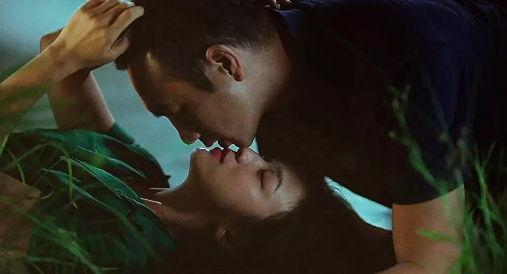 「ロングデイズ・ジャーニー この夜の涯てへ」黄珏 & タン・ウェイの画像