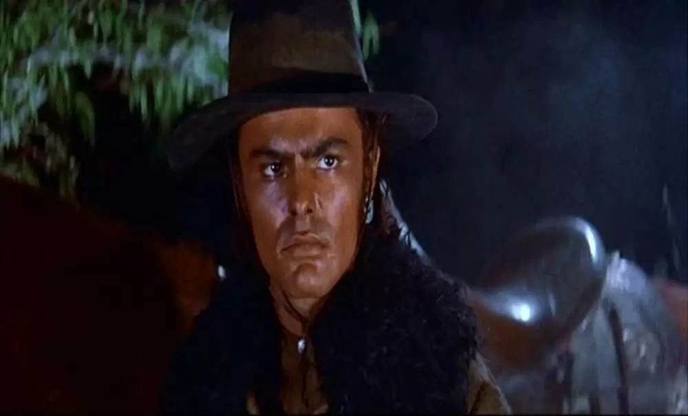 「許されざる者」ジョン・サクソンの画像