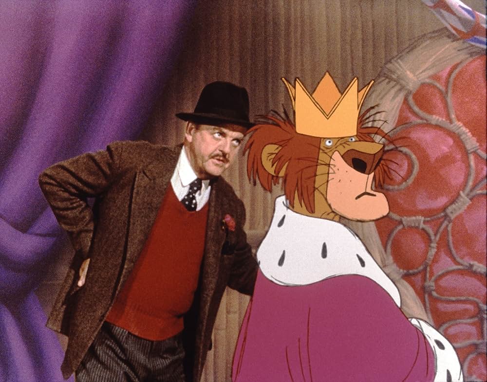 ベッドかざりとほうきの画像