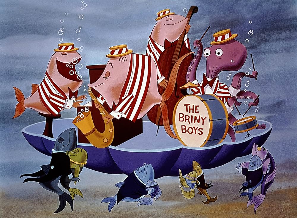 ベッドかざりとほうきの画像