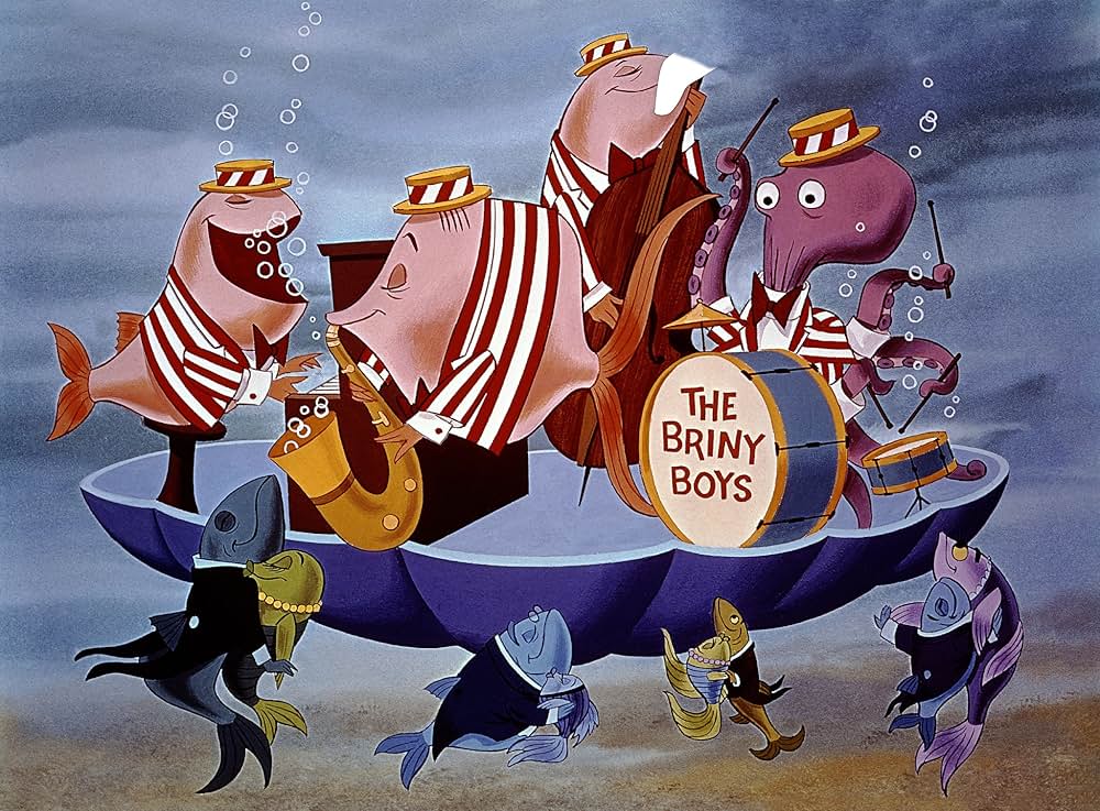 ベッドかざりとほうきの画像