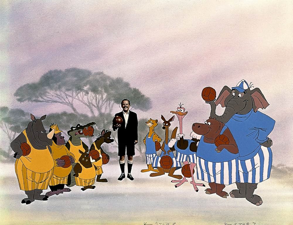 ベッドかざりとほうきの画像