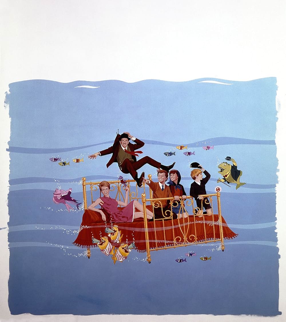 ベッドかざりとほうきの画像