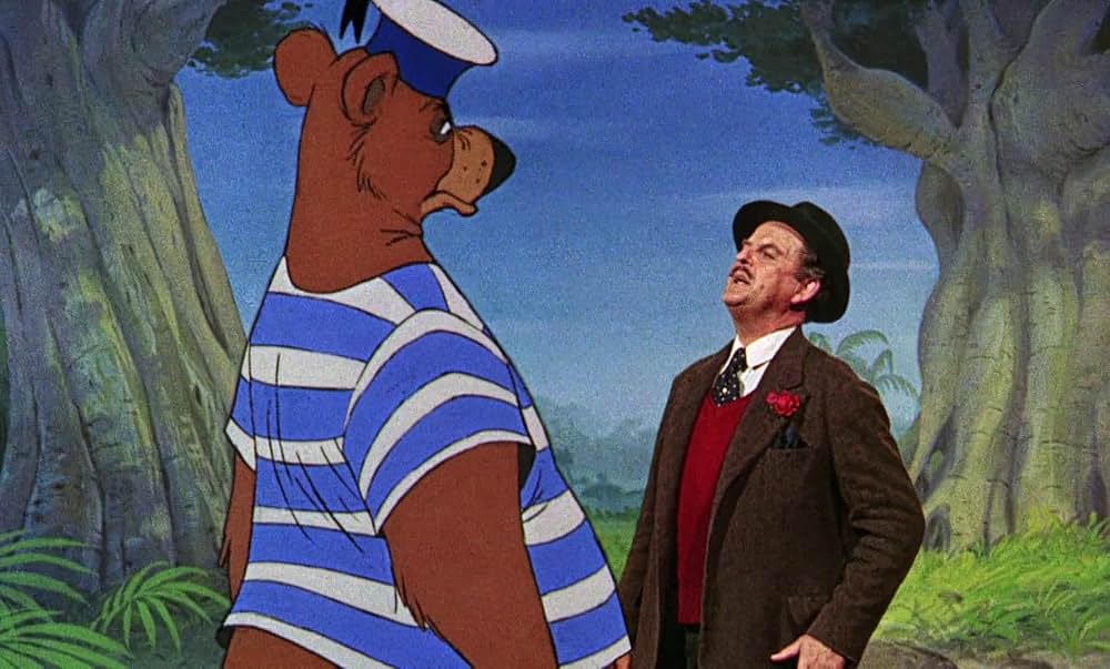 ベッドかざりとほうきの画像