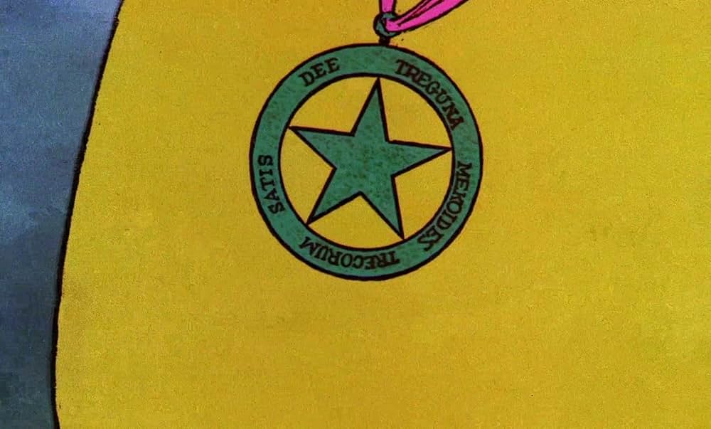 ベッドかざりとほうきの画像