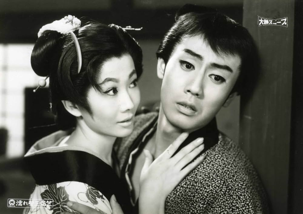 濡れ髪三度笠の写真