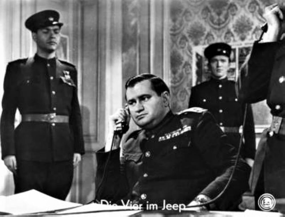 「ジープの四人」の画像