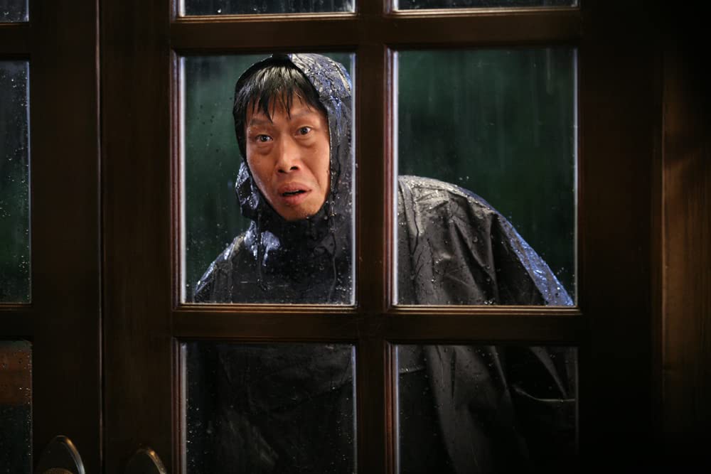 「黒く濁る村」柳海真の画像