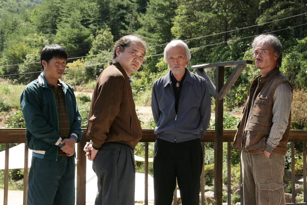 黒く濁る村の画像