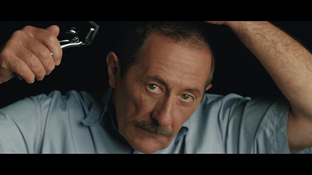 髪結いの亭主の画像