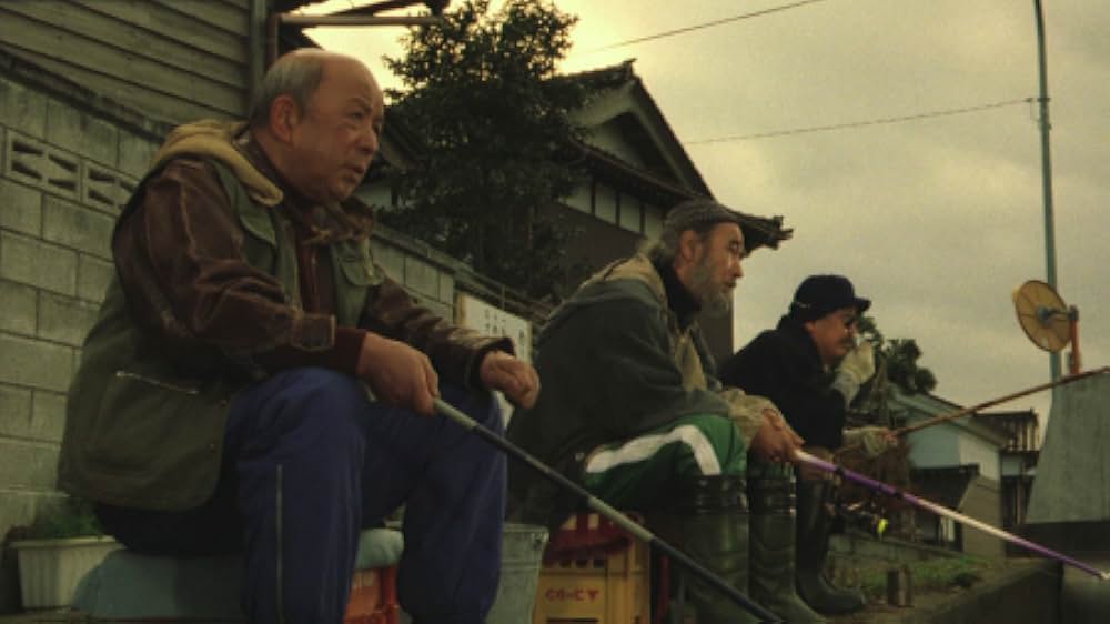 赤い橋の下のぬるい水の画像