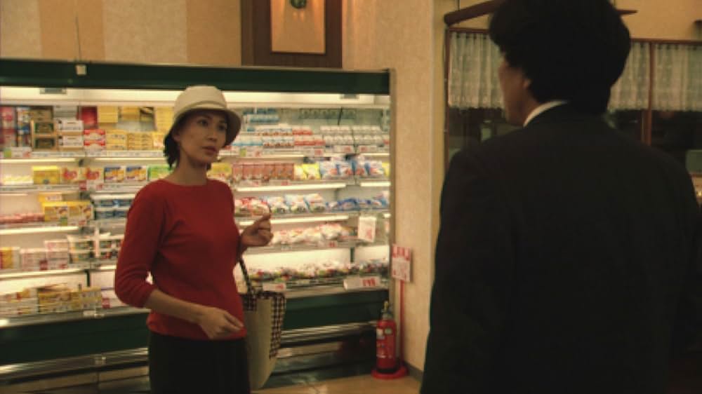 赤い橋の下のぬるい水の画像