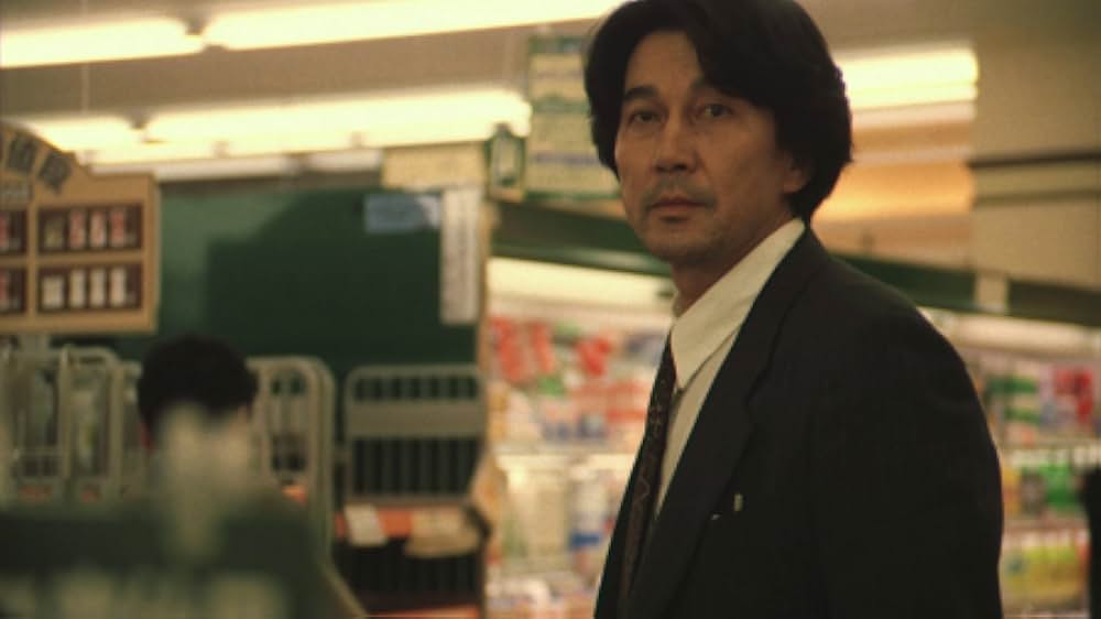 赤い橋の下のぬるい水の画像