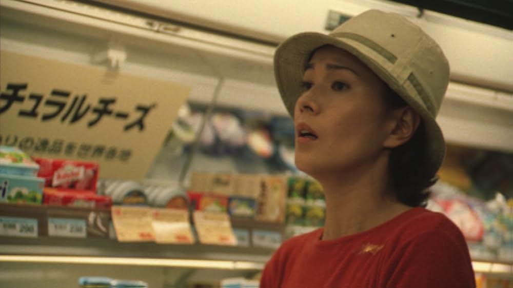 赤い橋の下のぬるい水の画像