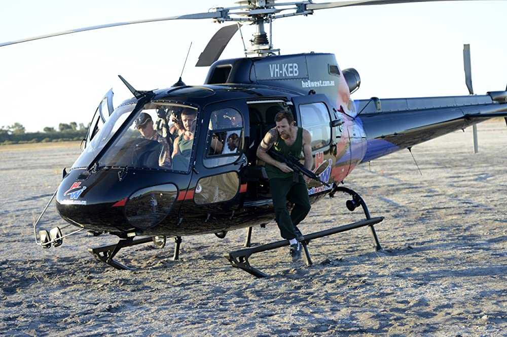 「ガンズ＆ゴールド」ユアン・マクレガー & エディ・バロー & マット・ネイブル & ブレントン・スウェイツの画像