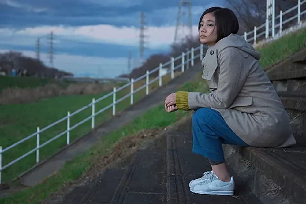 笑う招き猫の画像