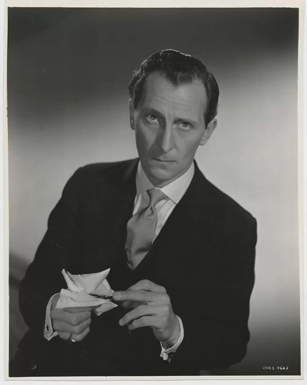 「情事の終り」ピーター・カッシングの画像