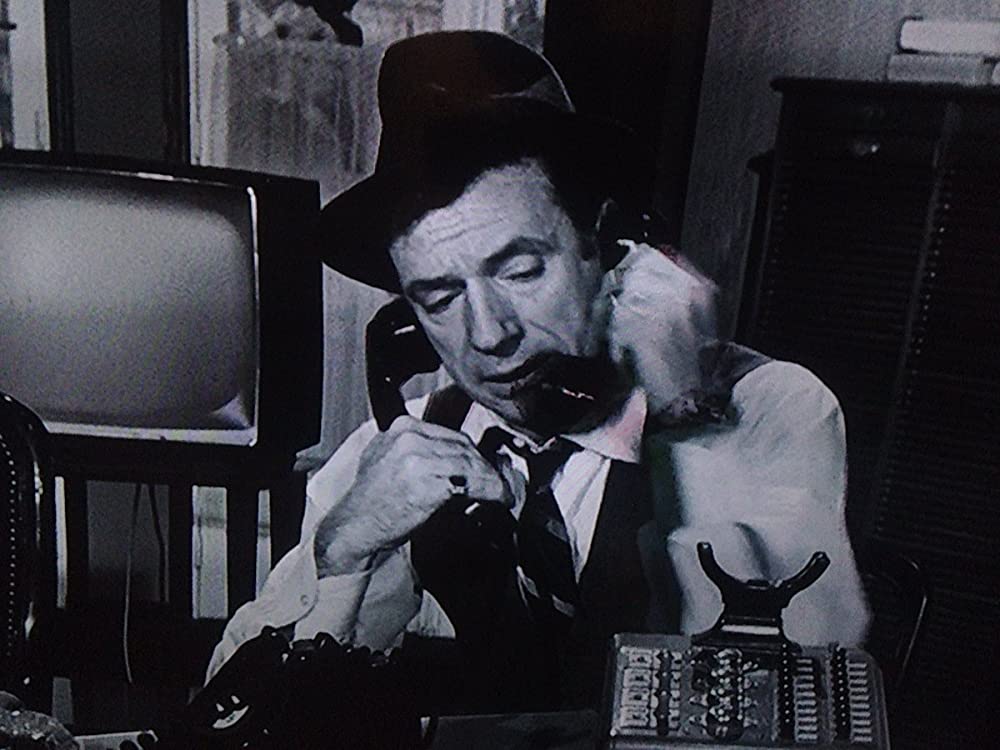 「七人目にかける男」イブ・モンタンの画像