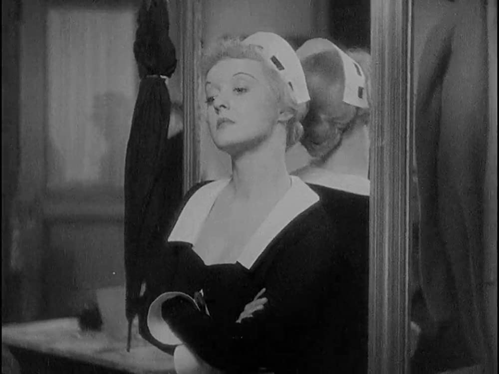 「痴人の愛」ベティ・デイビス & レスリー・ハワードの画像