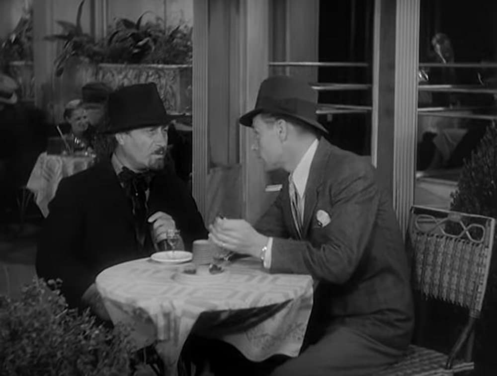 「痴人の愛」ベティ・デイビス & レスリー・ハワードの画像