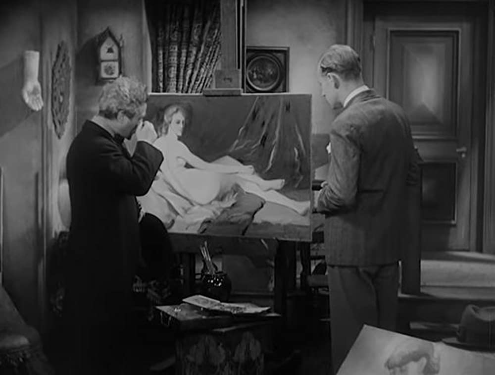 「痴人の愛」ベティ・デイビス & レスリー・ハワードの画像