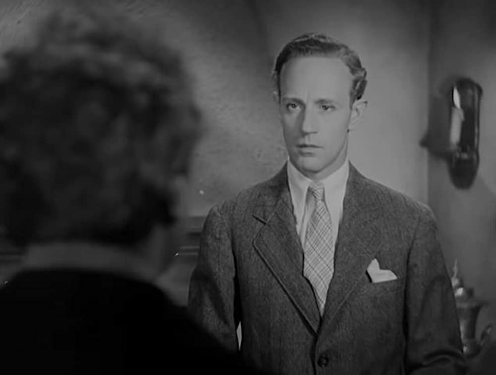 「痴人の愛」ベティ・デイビス & レスリー・ハワードの画像