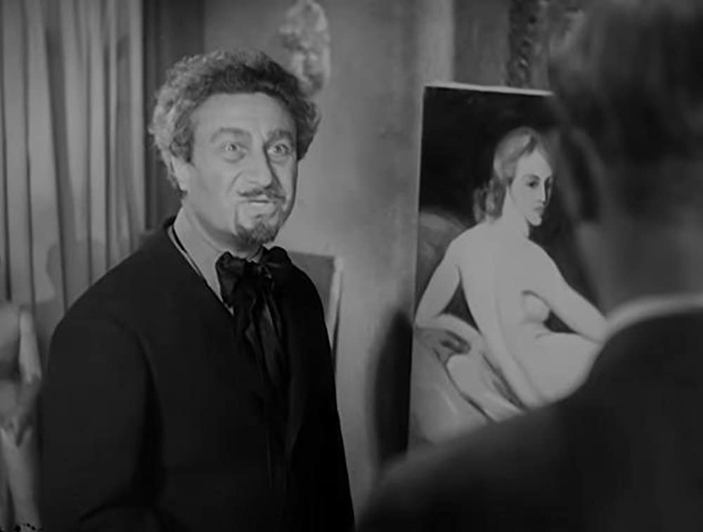 「痴人の愛」ベティ・デイビス & レスリー・ハワードの画像